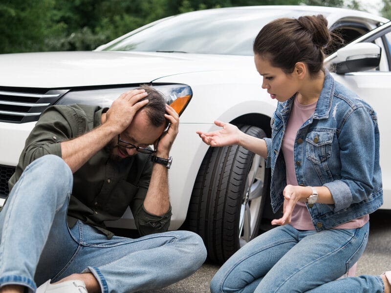 head injury after car accident, person in pain and struggling
