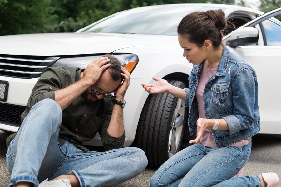 head injury after car accident, person in pain and struggling
