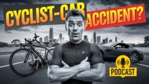 Monochrome image of a cyclist with a shocked expression standing in front of a fallen bike and a damaged car. The city skyline is in the background. Bold text reads "CYCLIST-CAR ACCIDENT?" with a podcast symbol.